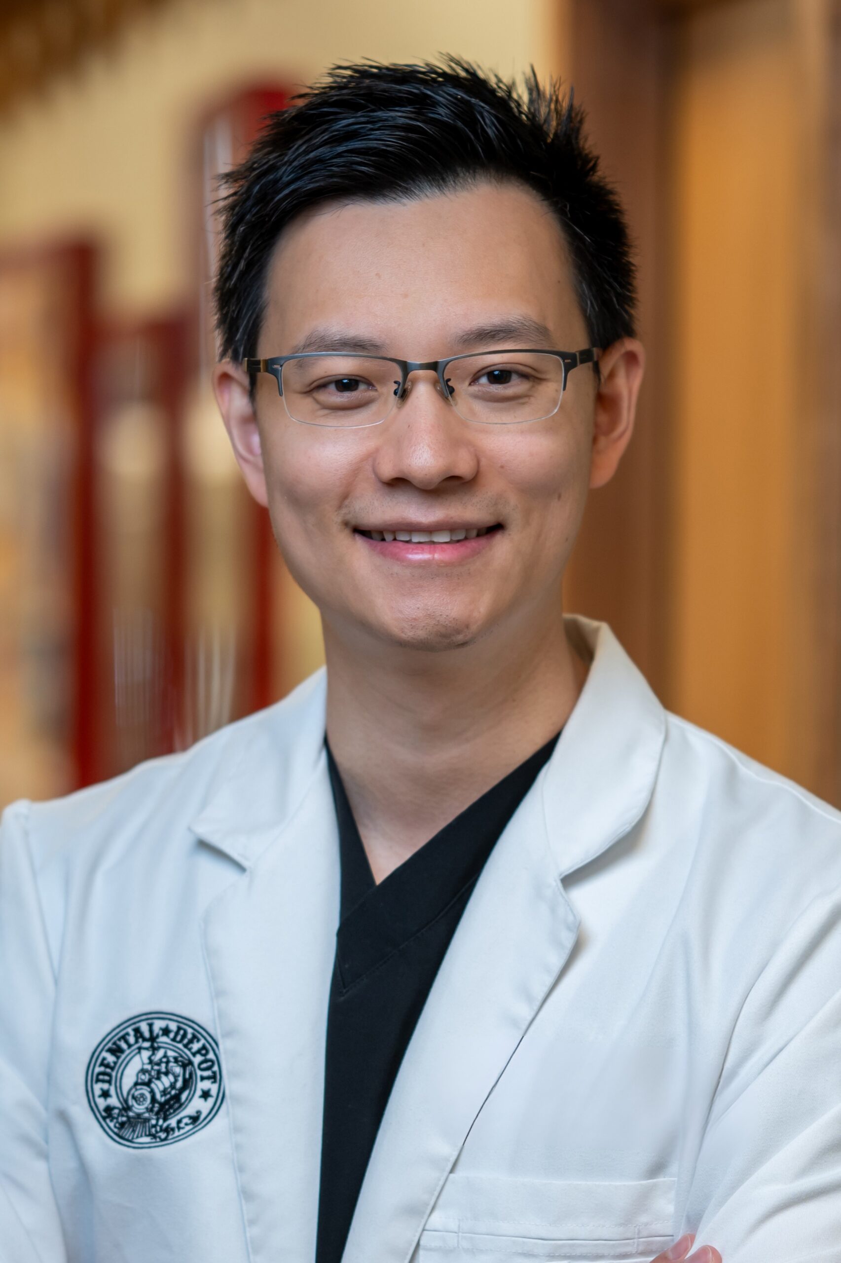 Head shot for Dr. Ke Huang at Dental Depot DFW.