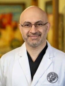 Dr. Ali Albeer headshot - dentist in The Colony, TX at Dental Depot.